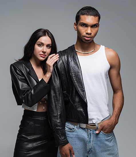 Trendy models showcasing fashion Models posing in stylish outfits