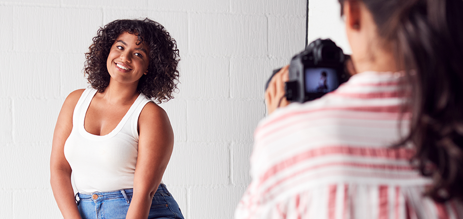 Joyful model in studio session Model smiling during a photoshoot