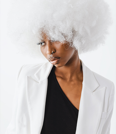 Fashion look by a modern model Model in stylish white blazer