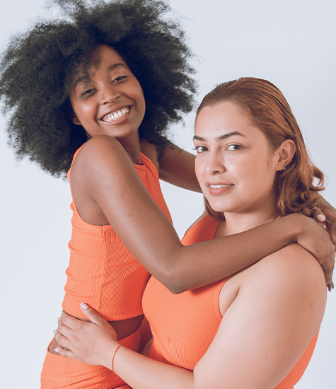 "Dynamic fashion by modern models Models in bright orange outfits