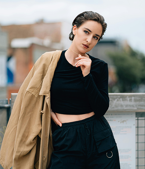 Fashion model showcasing style Model posing in urban setting
