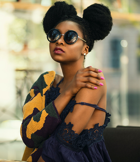 Chic look from a fashion model Model in stylish layered outfit